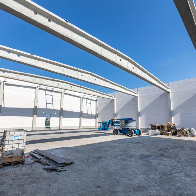 Warehouse construction site. Building a new commercial hall or storehouse