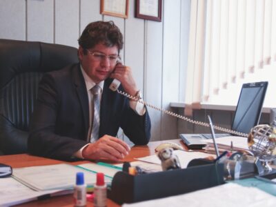 man on phone in a office